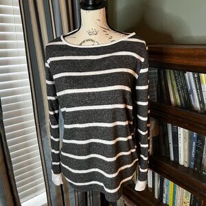 Dark Gray and White sweater, buttons down the back, size small.